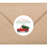 Christmas Vintage Red Truck Return Address  Classic Round Sticker<br><div class="desc">A rustic cute red truck returning from the woods or the Christmas tree lot with this year's Christmas Tree. Simple pickup truck, classic antique finish, black tires, and a bright green evergreen Christmas tree in the back. A great template with the return address and family name. This design features Christmas...</div>