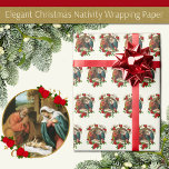 Christmas Virgin Mary Baby Jesus Joseph Nativity Wrapping Paper<br><div class="desc">Featuring a beautiful religious image of the Holy Family,  St. Joseph and the Virgin Mary at the birth of Jesus accented with red poinsettias.</div>