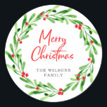 Christmas Watercolor Berries and Greenery Wreath Classic Round Sticker<br><div class="desc">Features holly red berries and greenery wreath and beautiful script typography. For further customization,  please feel free to contact me at kbasandra@gmail.com.</div>