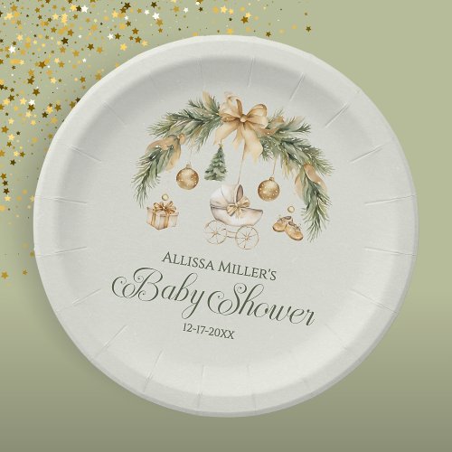 Cohesive winter baby shower tableware including watercolor pine plates, matching napkins, and cups stacked together