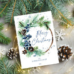 Christmas watercolor snowy pines wreath holiday card<br><div class="desc">Christmas greeting card  watercolor snowy pines wreath with blue winter berries and pine cones editable template invitation instant download</div>
