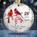 Christmas wedding anniversary red cardinal ceramic ornament<br><div class="desc">Cute red green red cardinal Christmas wedding Anniversary Ceramic ornament. Stylish and elegant beautiful inexpensive gift for couples celebrating their marriage. It’s an elegant wedding anniversary keepsake that can be personalized with your special anniversary information.</div>