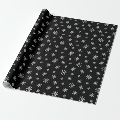 Christmas white snowflakes on black background wrapping paper