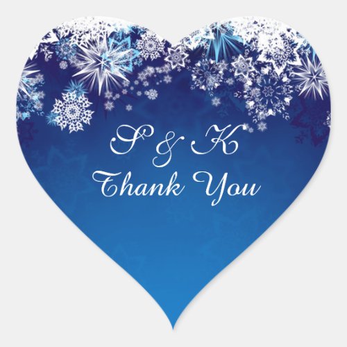 Christmas white snowflakes on blue heart shaped heart sticker
