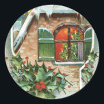 Christmas Window Classic Round Sticker<br><div class="desc">Peek in to this building window at the beautiful Christmas tree. Ice surrounds the frame</div>