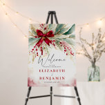 Christmas Winter Greenery Red Bow Wedding Welcome Foam Board<br><div class="desc">This Christmas, winter wedding welcome sign embodies rustic elegance with its enchanting watercolor design, featuring a red bow over evergreen leaves and red berries in a bohemian botanical arrangement. Perfect for couples who love art and unique designs, elegant country rustic, bohemian, and romantic themes, this invitation is an ideal choice...</div>