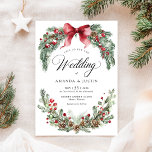 Christmas Winter Rustic Greenery Wedding  Invitation<br><div class="desc">This Christmas Winter Rustic Greenery Wedding Invitation is a beautiful way to set the tone for your holiday celebration. Featuring a festive watercolor wreath of greenery, pine sprigs, pinecones, and red berries, all tied with a classic bow, it creates a charming botanical look that feels both rustic and elegant. Perfect...</div>