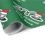 Christmas wrapping paper | Santa hat golf ball<br><div class="desc">Merry Christmas wrapping paper with Santa hat golf ball. Cute Holiday design for golfers,  golf players and sport fans. Funny Xmas gift wrap for golfing men,  women and kids (boys and girls). Personalizable with custom name and greeting. Green and red colors. Background color is customizable.</div>