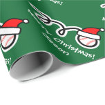 Christmas wrapping paper with Santa hat baseball<br><div class="desc">Merry Christmas wrapping paper with Santa hat baseball. Cute Holiday design for players and fans. Funny Xmas gift wrap for men,  women and kids (boys and girls). Personalizable with custom name and greeting. Green and red colors. Background color is customizable. Comical design.</div>