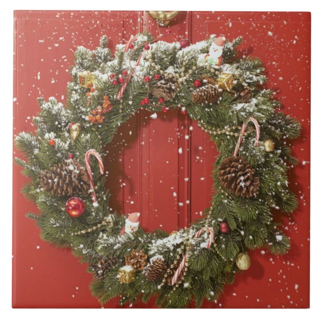Christmas wreath hanging on a door ceramic tile (Front)