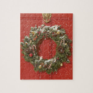 Christmas wreath hanging on a door jigsaw puzzle
