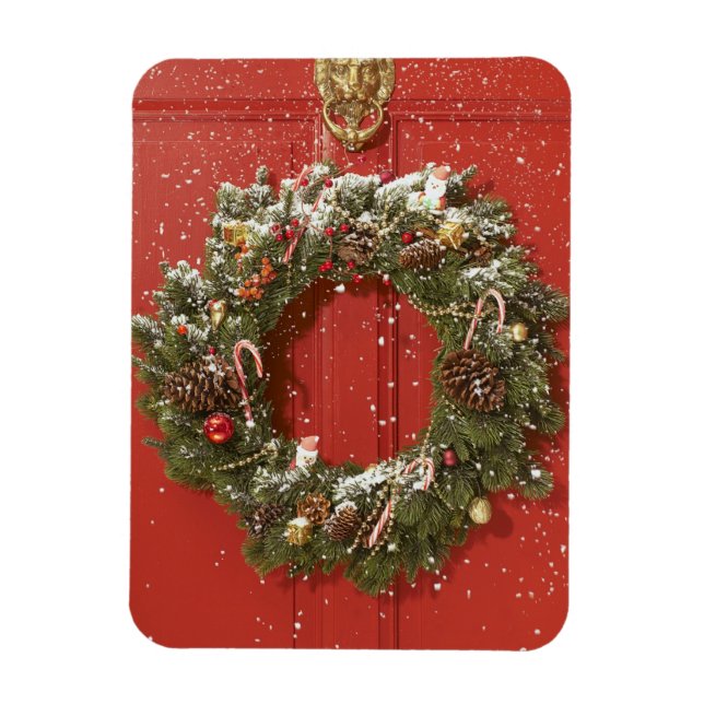 Christmas wreath hanging on a door magnet (Vertical)