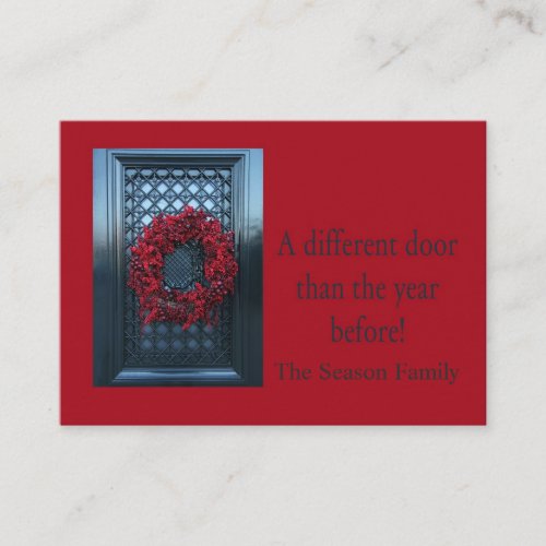 Christmas wreath on door new address enclosure card