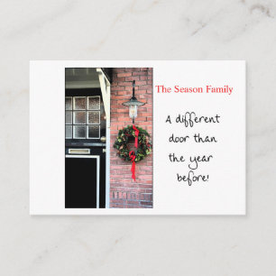 Christmas wreath on door new address enclosure card