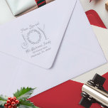 Christmas Wreath Peace Love and Joy Return Address Embosser<br><div class="desc">Elegant leafy holly Christmas holiday wreath as the "O" in "JOY",  "Peace Love and Joy" design with your family name and return address below.</div>