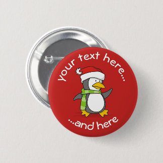 ChristmasChristmas penguin sitting with snow balls Pinback Button
