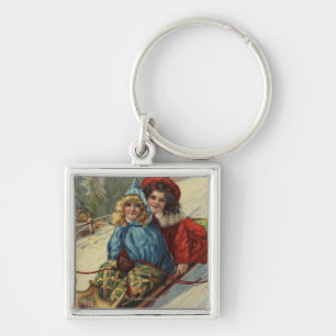 ChristmasTwo Little Girls Sledding Keychain