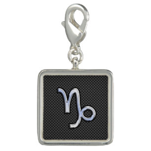 Chrome Style Capricorn Zodiac Sign on Carbon Fiber Charm