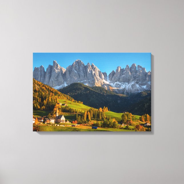 Church and village with mountains landscape canvas print (Front)