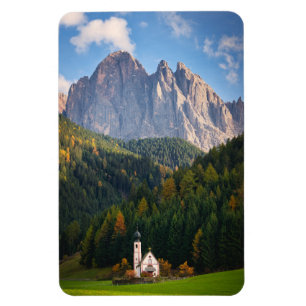 Church in front of Dolomites mountains in Italy Magnet