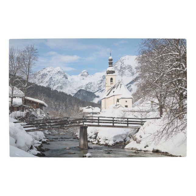 Church in the snow with Alps mountains in winter Metal Print (Front)