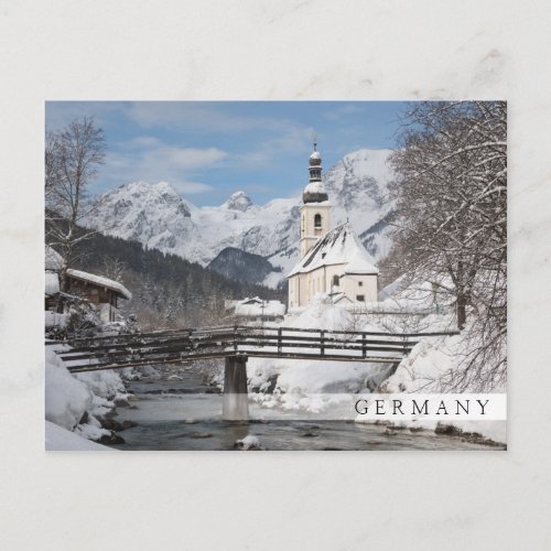 Church in the snow with Alps mountains in winter Postcard