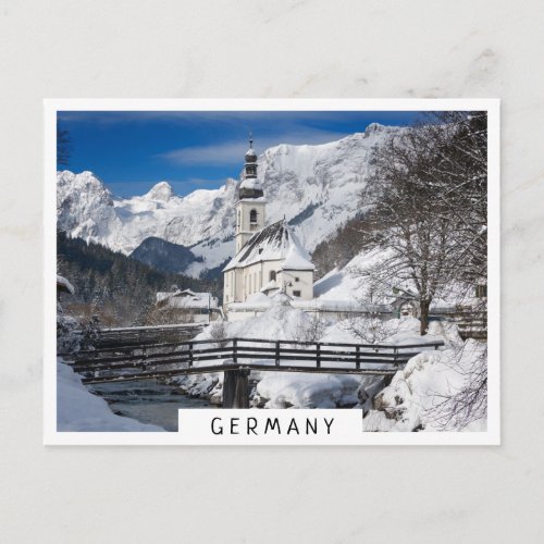 Church in the snow with Alps mountains Postcard