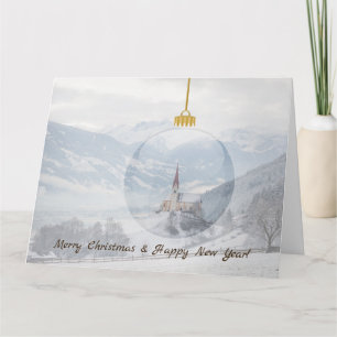 Church in winter in a glass ball christmas card