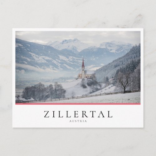 Church in winter in Zillertal in Austria Postcard