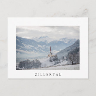 Church in Zillertal in winter white text postcard