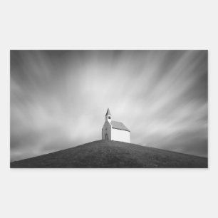 Church on a hill in black and white rectangular sticker
