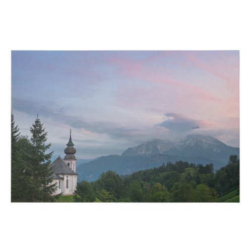 Church with Alps mountains at sunset Faux Canvas Print