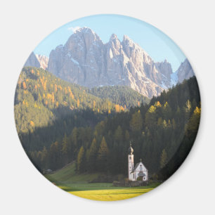 Church with Dolomites mountain round magnet