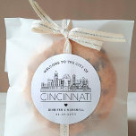 Cincinnati Skyline | Wedding Welcome Message Classic Round Sticker<br><div class="desc">Enhance your wedding welcome packages or event party favors with a custom set of welcome stickers! These elegant yet minimal-style stickers are tailored for a wedding taking place in the beautiful city of Cincinnati. They feature a modern deco skyline with the name of the city integrated underneath. All elements of...</div>