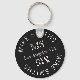 circle monogram, a stylish black keychain