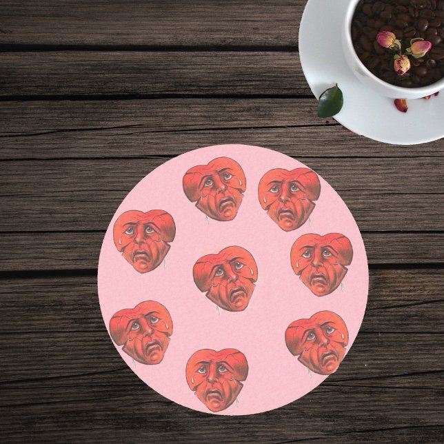 Circle of Surreal Broken Crying Red Heart Faces Sandstone Coaster (Red hearts with sad crying faces on light pink glass drink coaster.)