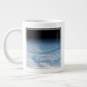 Circular Cloud Formation Over South Pacific Ocean. Giant Coffee Mug