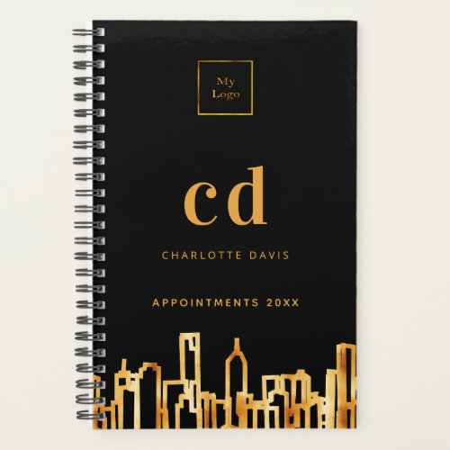 City skyline black gold business logo planner