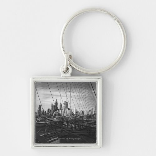 Cityscape through bridge cables keychain