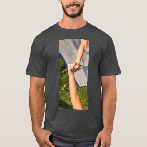Clamped hands during an Acro Yoga practice session T_Shirt