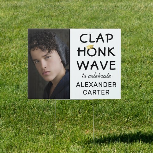 Clap Honk Wave 2022 Lockdown Graduation Sign - Clap, honk, wave graduate yard sign featuring a simple white background that can be changed to any color, a photo of the student, a graduation cap, gold glitter, and a congratulations template that is easy to personalize.