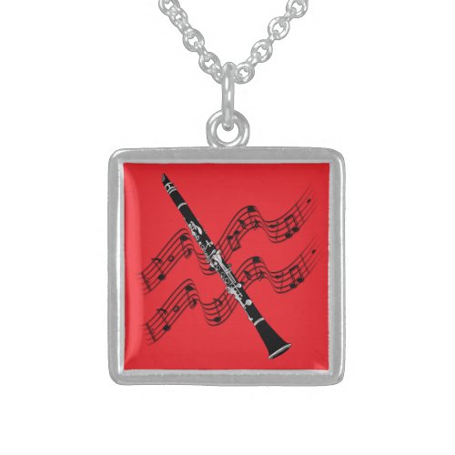Clarinet on festive red background sterling silver necklace