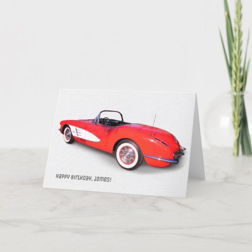 classic 1960 red corvette on white card