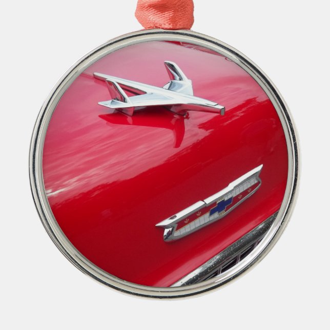 Classic aero style hood ornament with red paint (Front)