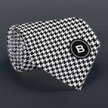 Classic black and white houndstooth with monogram neck tie<br><div class="desc">Chic trendy fashion stylish black and white houndstooth pattern with monogram, the retro preppy style dog tooth check pattern give this design a classic and sophisticated look. Cool gifts for men. Custom the personalized monogram with your own initial, you can also click "customize it!" button under product photo to edit...</div>