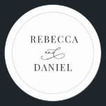 Classic Black and White Personalized Names Wedding Classic Round Sticker<br><div class="desc">Designed to coordinate with our Romantic Script wedding collection,  this customizable names Sticker,  features a calligraphy graphic ampersand,  paired with a classy serif font in black. Matching items available.</div>