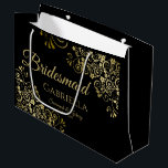 Classic Black & Gold Lace Elegant Bridesmaid Large Gift Bag<br><div class="desc">This beautiful gift bag is designed as a wedding gift or favor bag for Bridesmaids. It features an elegant black and gold design with golden lace frills in the corners the text "Bridesmaid" as well as a place to enter her name, the couple's name, and the wedding date. Fill with...</div>
