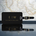 Classic Black Gold Minimalist Monogram Name Luggage Tag<br><div class="desc">Elevate your travel experience with our Classic Elegant Modern Minimalist Monogram Luggage Tag. This meticulously designed accessory seamlessly combines timeless elegance with contemporary minimalism, ensuring your luggage stands out with sophistication. Crafted with precision and attention to detail, this luggage tag is more than just a practical item; it's a personalized...</div>