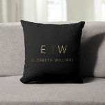 Classic Black Gold Minimalist Monogram Name Throw Pillow<br><div class="desc">Elevate your home decor with our Classic Elegant Modern Minimalist Monogram Throw Pillows. These exquisite cushions seamlessly blend timeless sophistication with contemporary minimalism, adding a touch of refinement to your living space. Crafted with precision and meticulous attention to detail, these throw pillows are more than just decorative; they are personalized...</div>