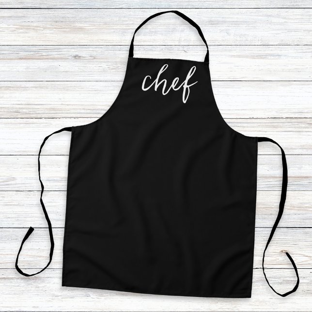 Classic Black Minimal Simple Stylish Kitchen Chef Apron (A stylish, minimalist, black kitchen apron with the word 'chef' in white script typography)